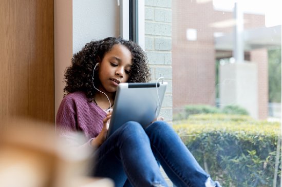 Girl Watching IPad